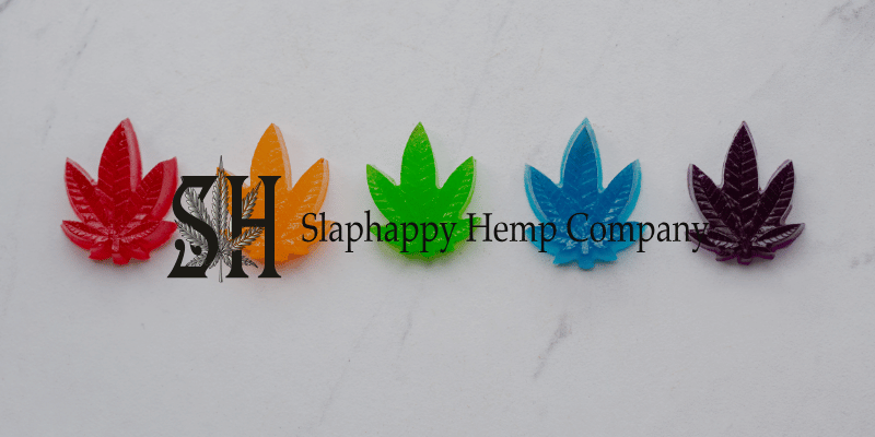 multicolored gummies in the shape of hemp flowers